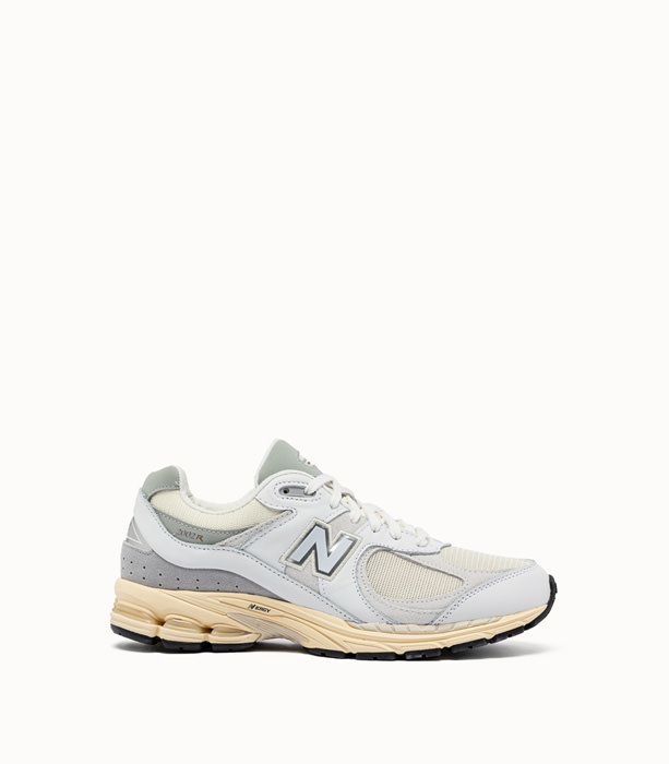 NEW BALANCE: 2002R SNEAKERS COLOR WHITE